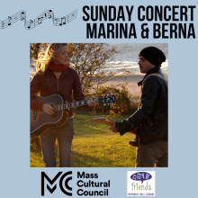 Marina and Berna playing guitars outside