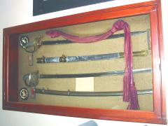 Two swords and holders